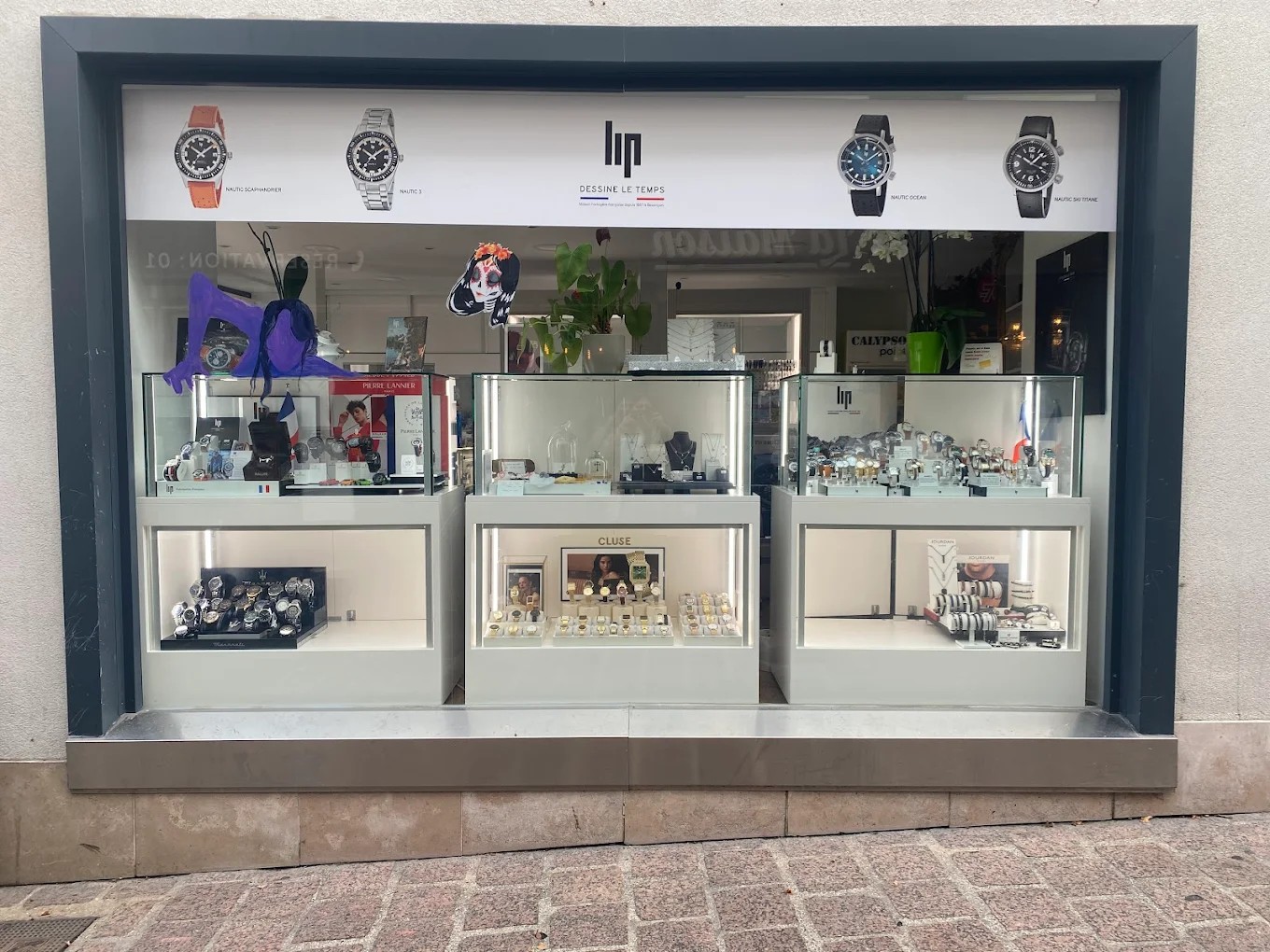 Vitrine de la bijouterie A.Storia Création à Montmorency — Lip, Pierre Lannier, CLUSE, Jourdan